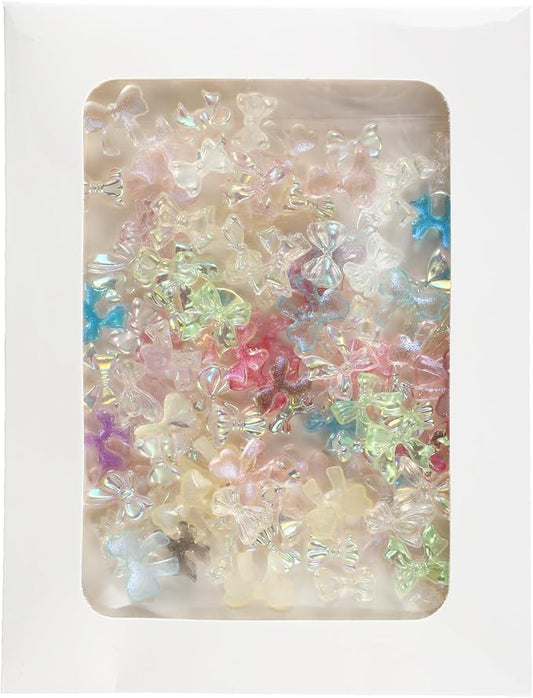 100Pcs Iridescent Resin Bows - 3D Aurora Bowknot Charms for Nail Art, Miniature Dollhouse Decor & DIY Crafts, Tiny Ribbon Flatbacks with Window Envelope Packaging