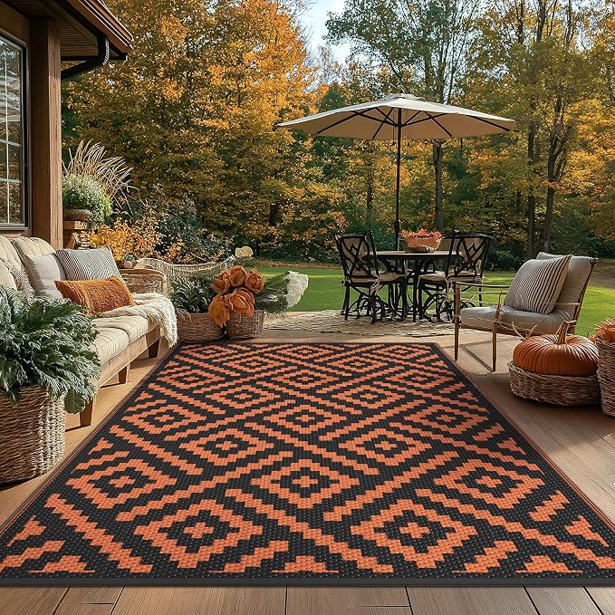 GENIMO Outdoor Rug for Patio, 6'x9' Fall Reversible Plastic Straw Rugs, Waterproof Halloween RV Camping Mat Lightweight Carpet for Camper, Balcony, Deck, Backyard, Picnic, Black Orange
