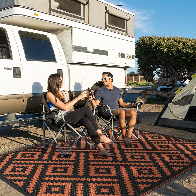 GENIMO Outdoor Rug for Patio, 6'x9' Fall Reversible Plastic Straw Rugs, Waterproof Halloween RV Camping Mat Lightweight Carpet for Camper, Balcony, Deck, Backyard, Picnic, Black Orange